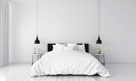 Utilisez le gris et le blanc pour une chambre cocooning !